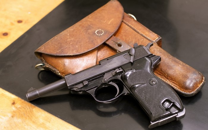 Walther P38 pistol with leather holster