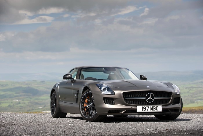 Mercedes-Benz SLS 63 AMG GT parked on gravel