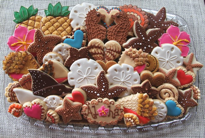 Assorted Hawaiian themed cookies on a platter