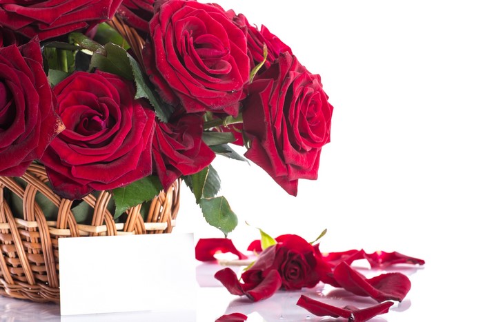 Red Roses in a Wicker Basket with a Card