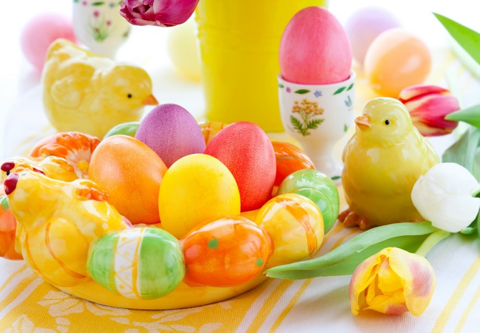 Easter Chicks and Colorful Eggs with Tulips