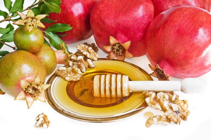 Pomegranates, Honey, Walnuts, and Plate