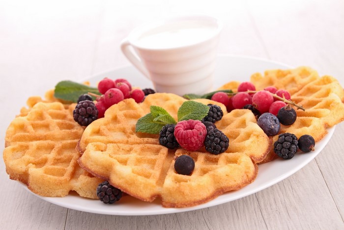 Waffles with fresh berries and cream