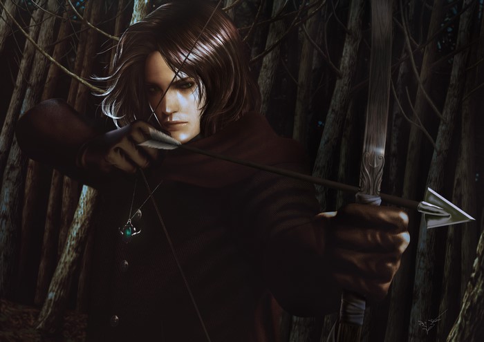 Man with bow and arrow in forest