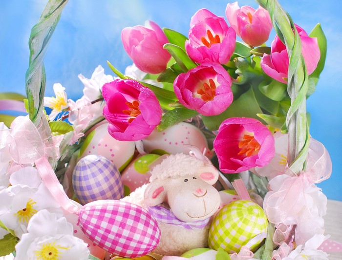 Easter basket with tulips, eggs, and a lamb