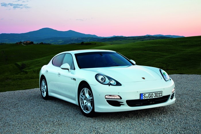 White Porsche Panamera Diesel on gravel road