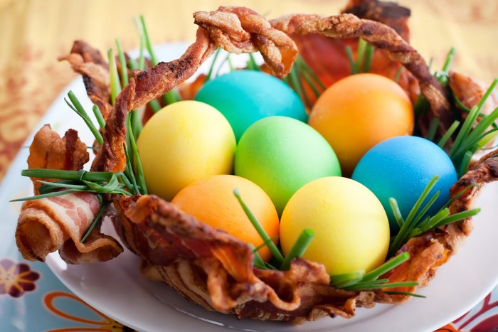 Easter eggs in a bacon basket with chives