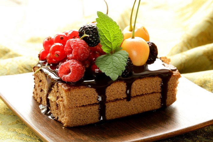 Chocolate cake with berries and chocolate drizzle