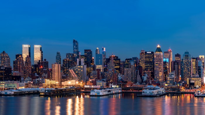 New York City skyline at night with river