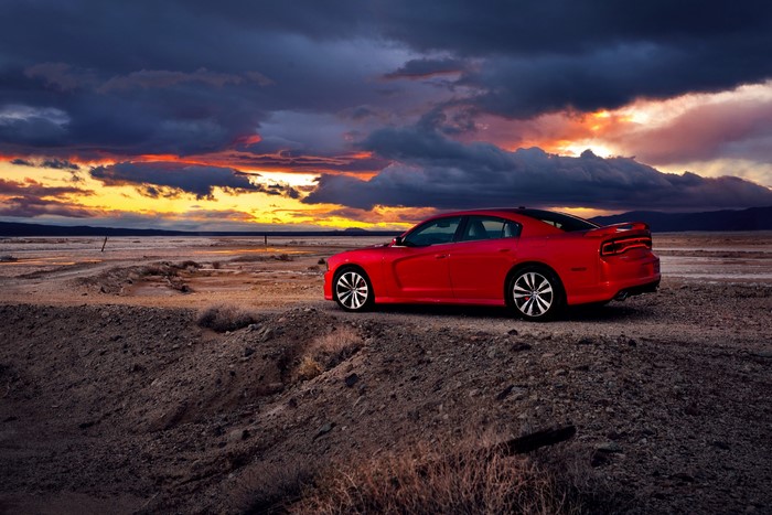 Red Dodge Charger SRT8 at sunset