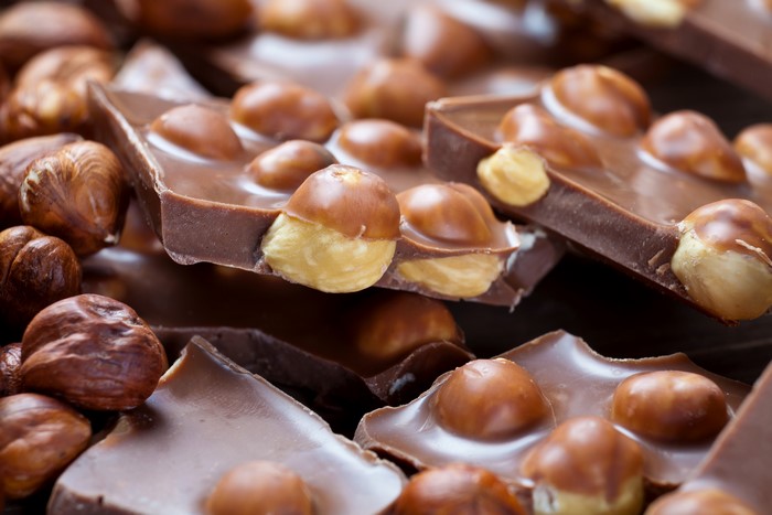 Chocolate bar with hazelnuts, close-up