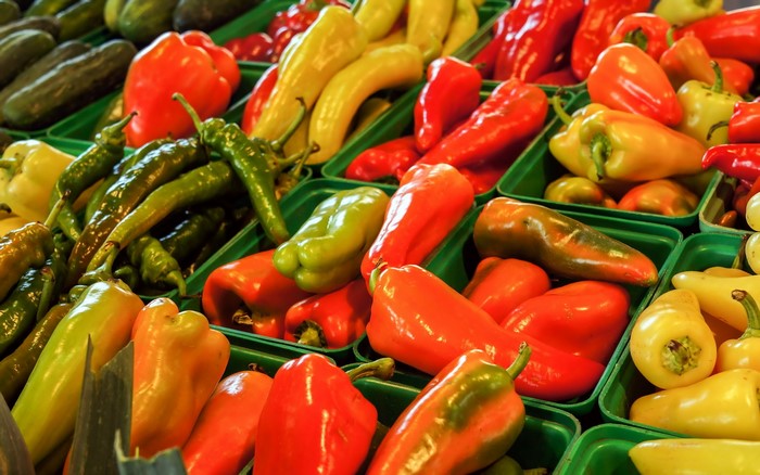 Assortment of colorful bell peppers and chili peppers