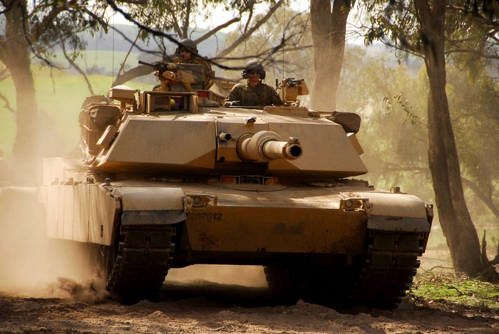 M1 Abrams tank in a wooded area