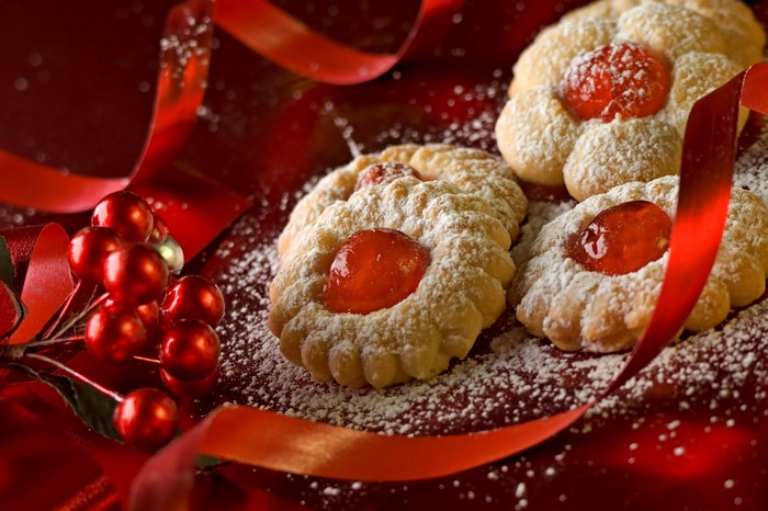 Cookies with red berries and ribbon