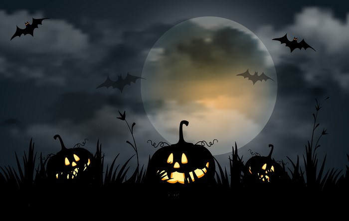 Halloween Night with Pumpkins and Bats under the Moon