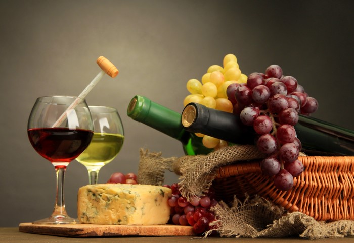 Still-life with wine, grapes, and cheese