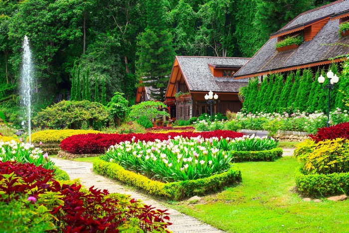 Beautiful Garden with Fountain and Houses