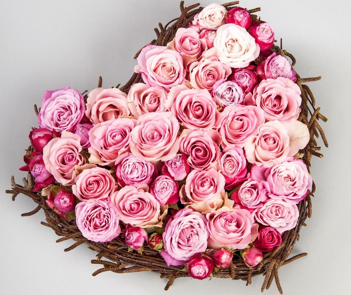 Heart-shaped arrangement of pink roses
