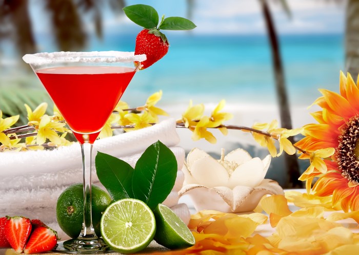 Strawberry and Lime Cocktail on a Beach