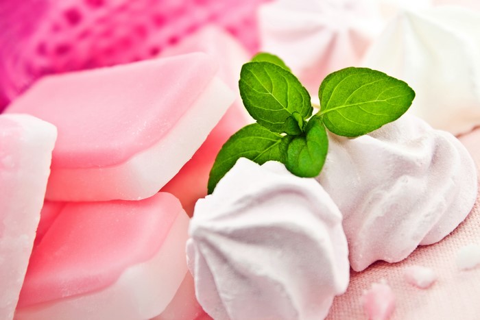 Pink and white sweets with mint leaf