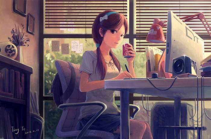 Girl drinking soda and working on computer