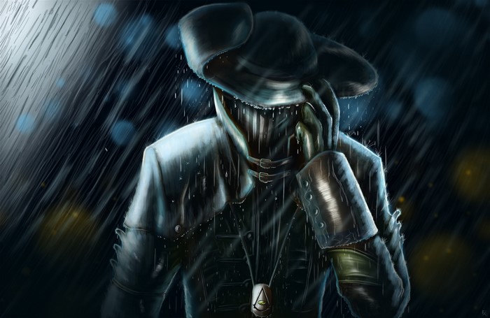 Man in hat and coat in the rain