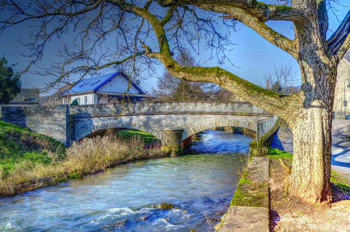 Stone bridge over a river in Germany