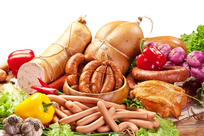 Meat products, sausages, bell peppers, onions, and garlic