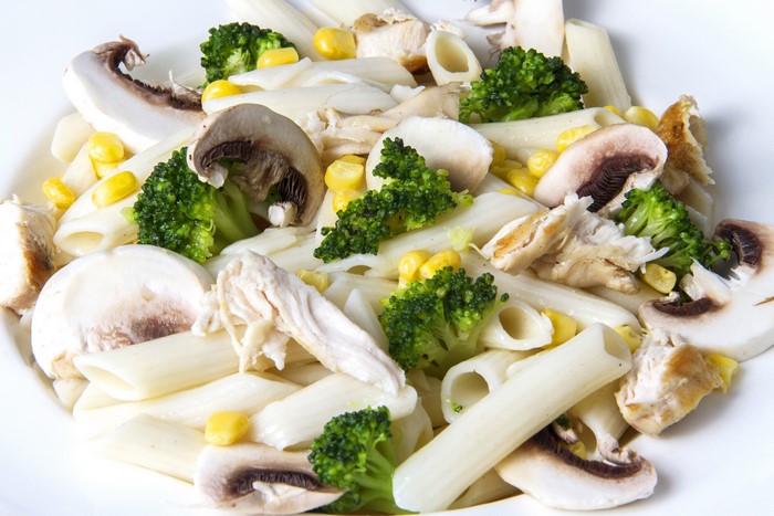 Pasta salad with chicken, mushrooms, broccoli, and corn