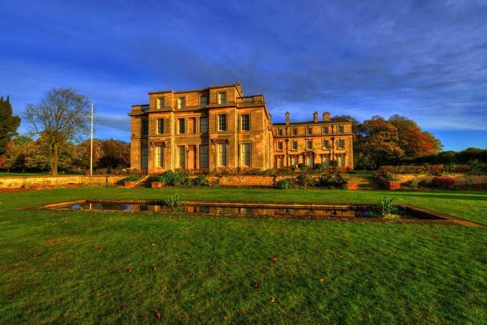 Normanby Hall, England, with a reflecting pool and garden