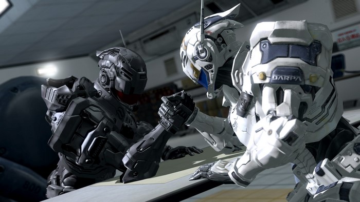 Two robots arm wrestling in a lab