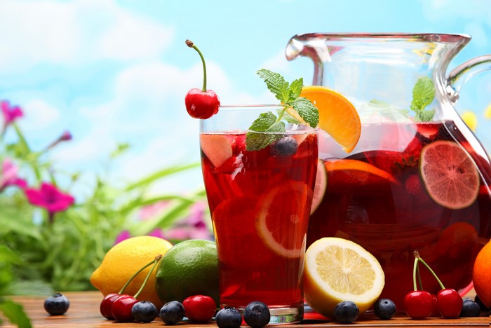 Fruit Punch in a Highball Glass and Pitcher