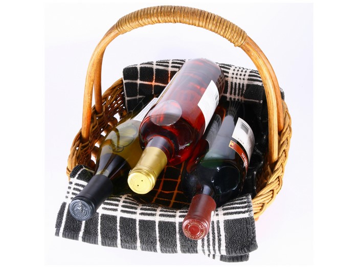 Wine bottles in a wicker basket