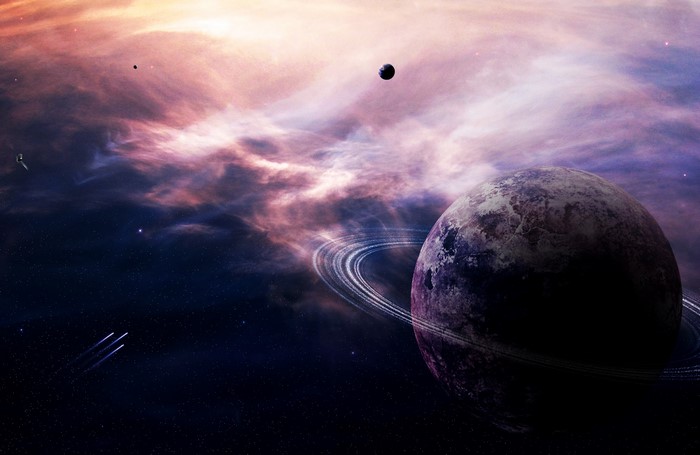 Planet with rings in a colorful nebula