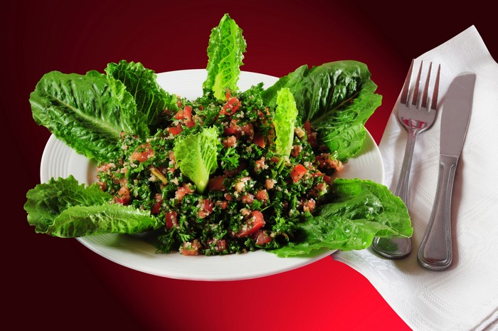 Tabbouleh salad with lettuce and cutlery