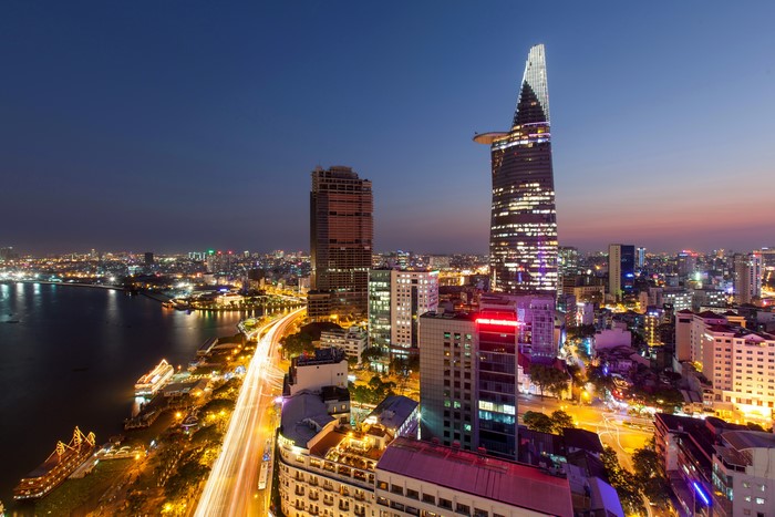 Ho Chi Minh City skyline at night with river