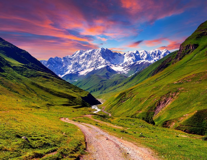 4K Scenery of Mountains and Roads with Grass