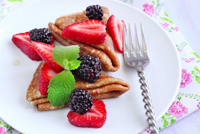Pancakes with Strawberries and Blackberries on a Plate