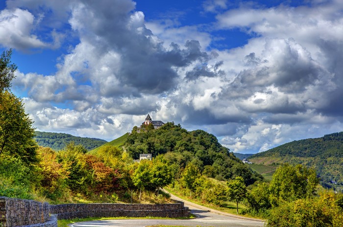 Castle on a hill in Zell, Germany with clouds