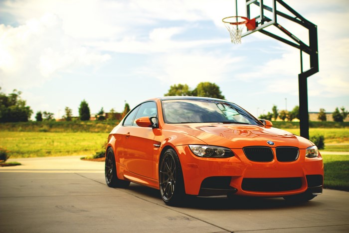 Orange BMW M3 Coupe with Basketball Hoop