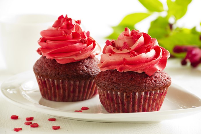 Red Velvet Cupcakes with Pink Frosting and Heart Sprinkles