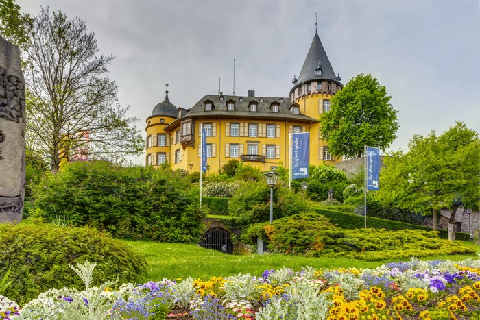 Genovefaburg Mayen Castle in Germany with Flowers