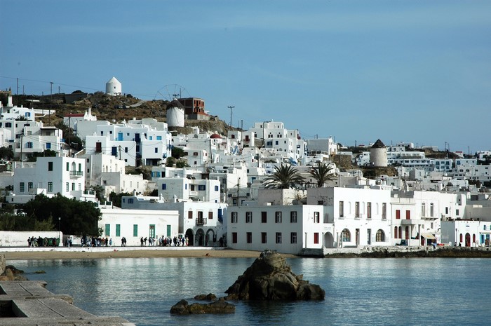 White buildings and windmills in Mykonos, Greece