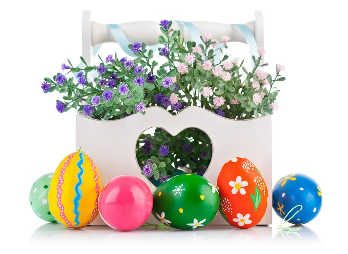 Easter eggs and flowers in a basket