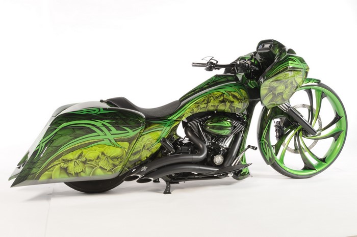 Custom green motorcycle with skull graphics