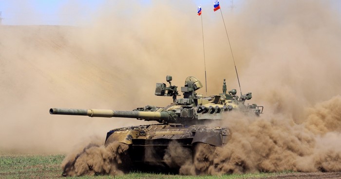 Russian T-80U tank in dust cloud
