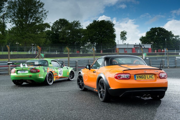 Two Mazda MX-5 GT cars on a race track