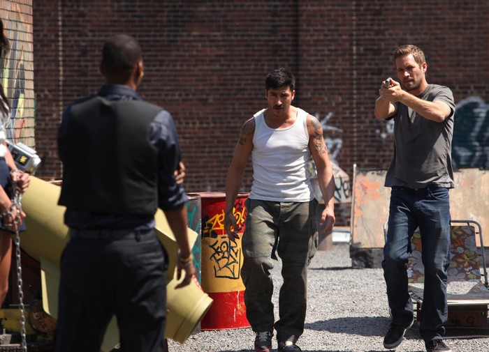 Brick Mansions: Three men in an urban setting