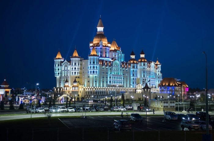 Illuminated castle-like building at night in Russia