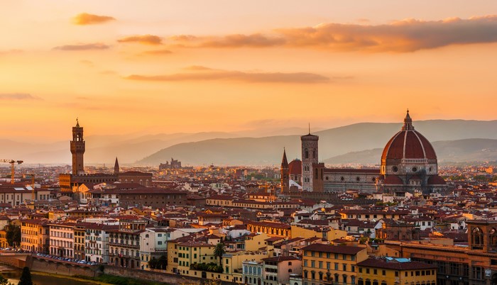 Florence cityscape with Duomo and Palazzo Vecchio at sunset